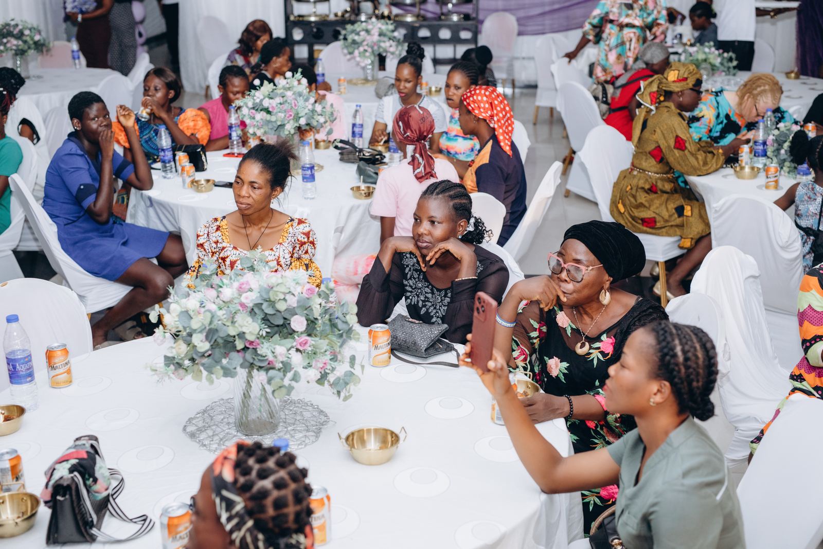 Women gathered at tables at the 2025 We Remember You event